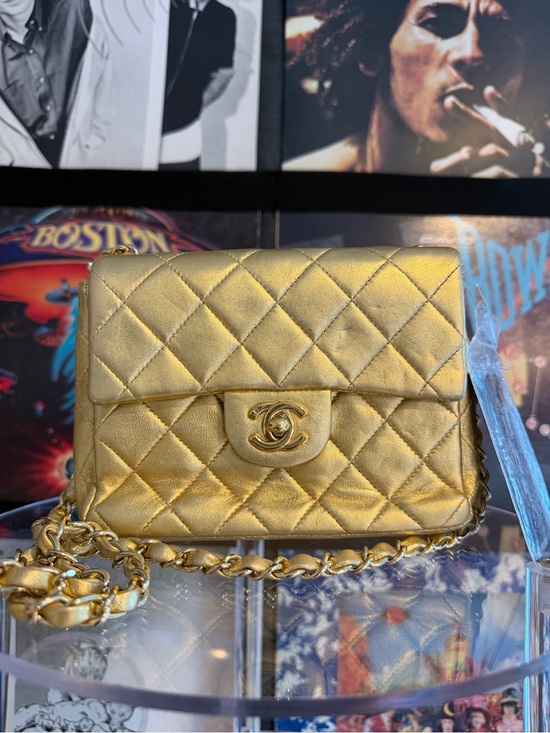 CHANEL Handbags - CHANEL Gold Quilted Mini Flap Bag with Chain Strap SERIES 7